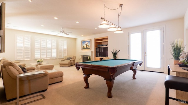 recreation room with recessed lighting, billiards, a ceiling fan, carpet floors, and a glass covered fireplace