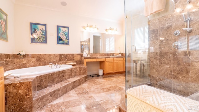 bathroom featuring a garden tub, crown molding, vanity, and a stall shower