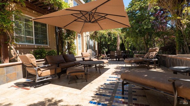 view of patio / terrace with an outdoor hangout area and outdoor dining area