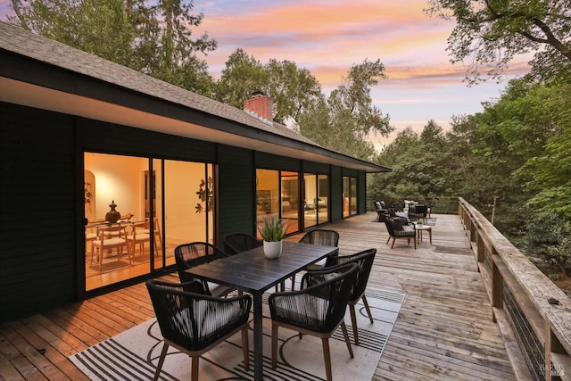 deck featuring outdoor dining space