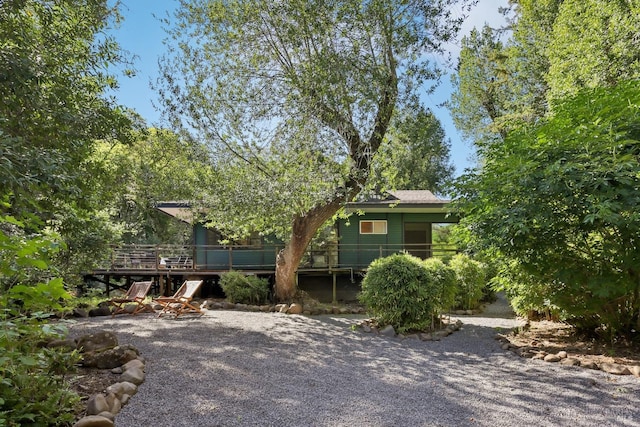 rear view of property with a deck