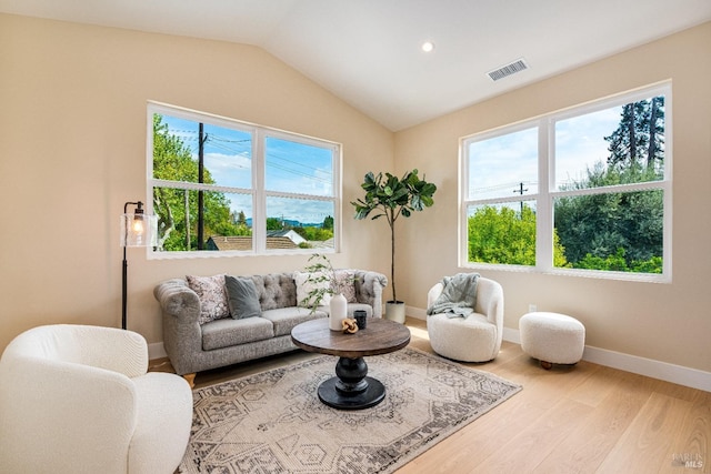431 Seymour St, Napa, CA 94559 - living area featuring wood finished floors, vaulted ceiling, baseboards, and recessed lighting