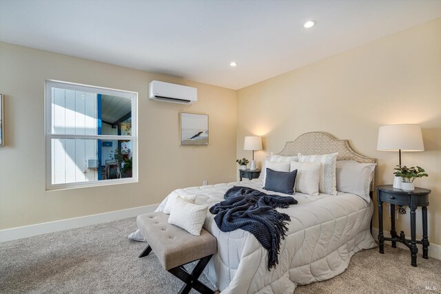 carpeted bedroom with baseboards, a closet, and recessed lighting