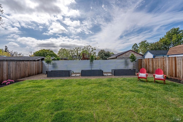 view of yard with a fenced backyard
