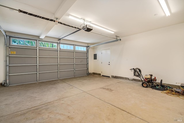 garage featuring a garage door opener