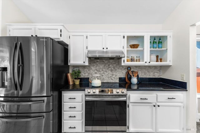 kitchen featuring stainless steel electric range, white cabinetry, fridge with ice dispenser, decorative backsplash, and under cabinet range hood