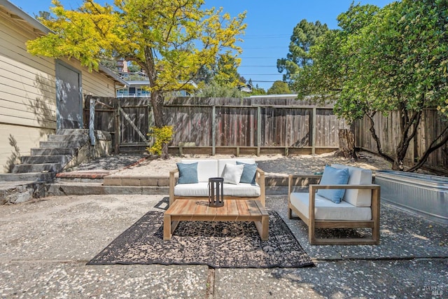view of patio / terrace featuring a fenced backyard and outdoor lounge area