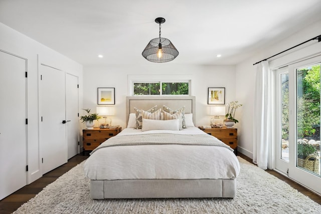 bedroom featuring dark wood-style floors and recessed lighting