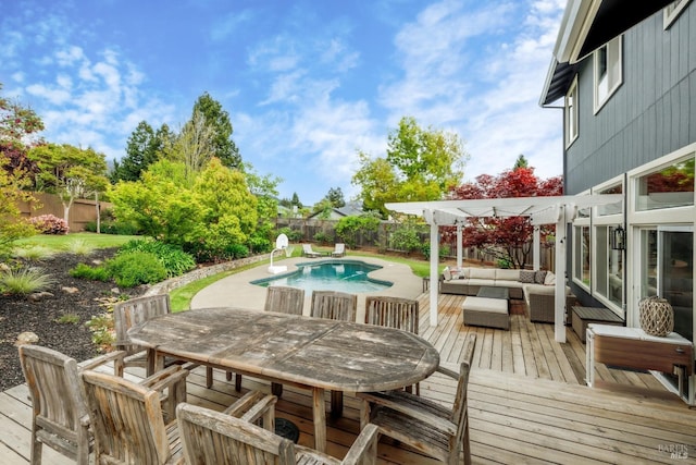 wooden deck featuring a fenced in pool, outdoor lounge area, a pergola, a fenced backyard, and outdoor dining area