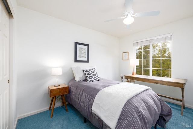 carpeted bedroom with baseboards, a ceiling fan, and a closet