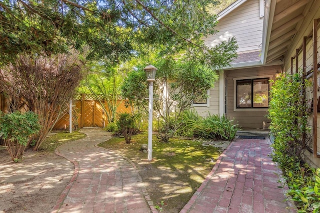 view of yard with fence and a patio area