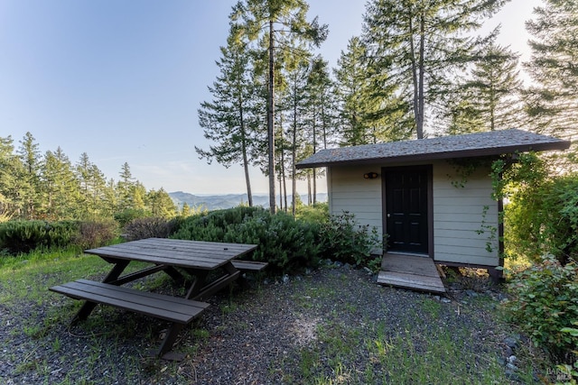view of shed featuring a mountain view