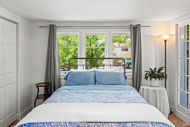 bedroom featuring wood finished floors