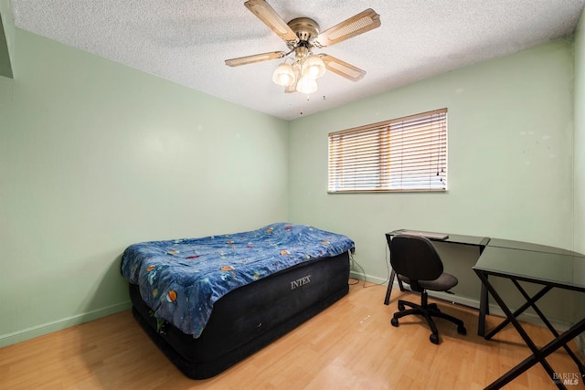 1119 Clelia Ct, Petaluma, CA 94954 - bedroom featuring a textured ceiling, baseboards, and wood finished floors