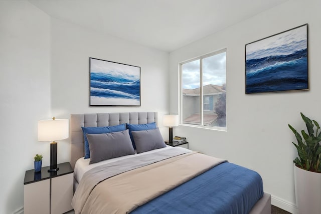 bedroom with baseboards