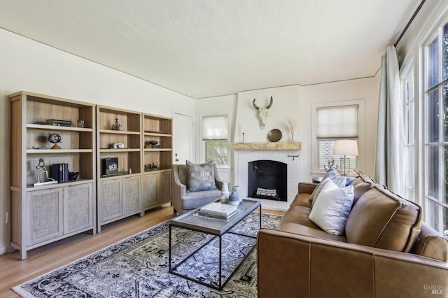 17 Hanns Ave, Vallejo, CA 94590 - living room with a brick fireplace and light wood finished floors