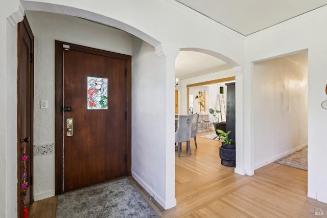17 Hanns Ave, Vallejo, CA 94590 - foyer featuring arched walkways, wood finished floors, and baseboards