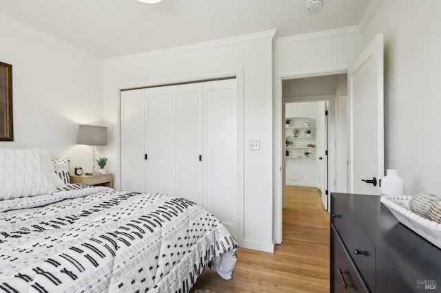 17 Hanns Ave, Vallejo, CA 94590 - bedroom with a closet, baseboards, crown molding, and light wood-type flooring