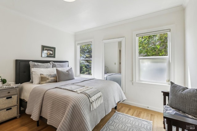 17 Hanns Ave, Vallejo, CA 94590 - bedroom with baseboards, wood finished floors, ornamental molding, and multiple windows