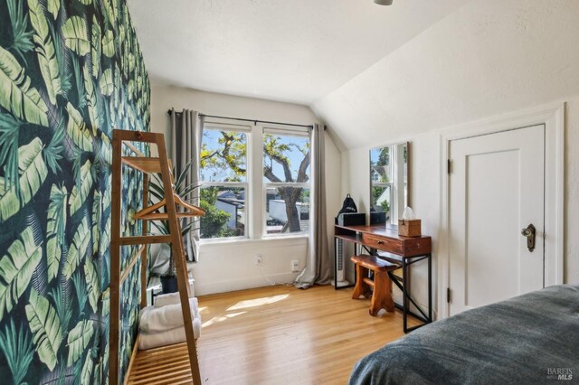17 Hanns Ave, Vallejo, CA 94590 - bedroom with baseboards, vaulted ceiling, and wood finished floors