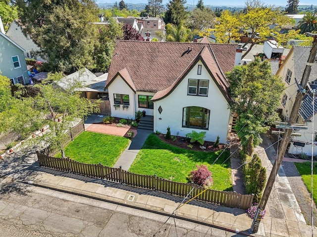 17 Hanns Ave, Vallejo, CA 94590 - tudor house featuring stucco siding, a front lawn, and a fenced front yard