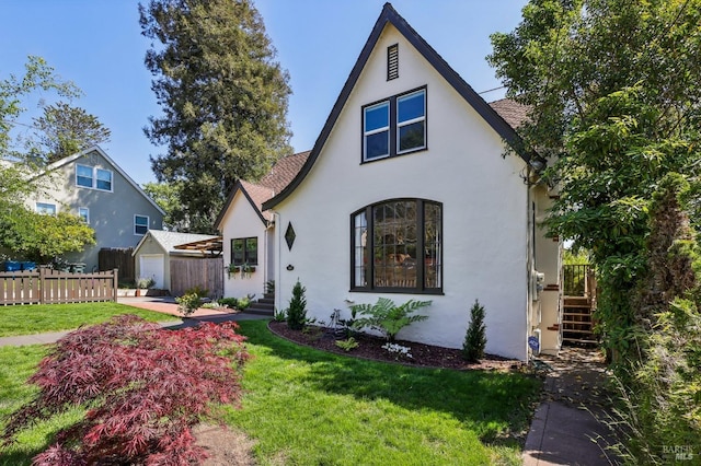 17 Hanns Ave, Vallejo, CA 94590 - english style home featuring stucco siding, fence, and a front yard