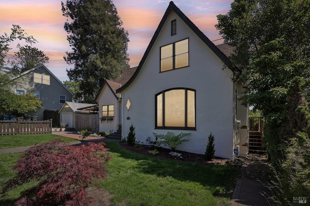 17 Hanns Ave, Vallejo, CA 94590 - view of front of property with a lawn, stairs, stucco siding, and fence