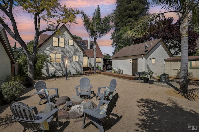 17 Hanns Ave, Vallejo, CA 94590 - view of yard featuring a fire pit, an outbuilding, and a wooden deck