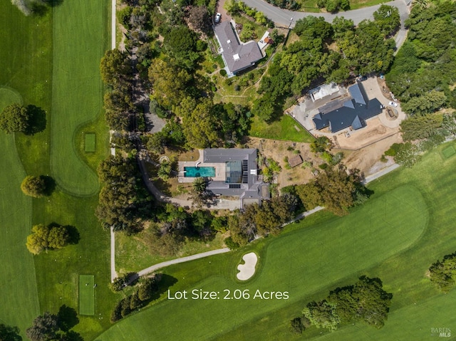 birds eye view of property featuring view of golf course
