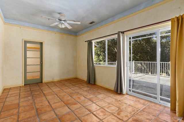 empty room with plenty of natural light, visible vents, baseboards, and ceiling fan