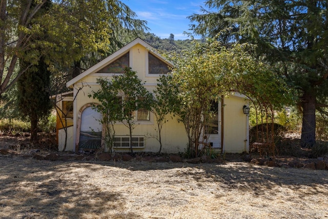 exterior space with stucco siding