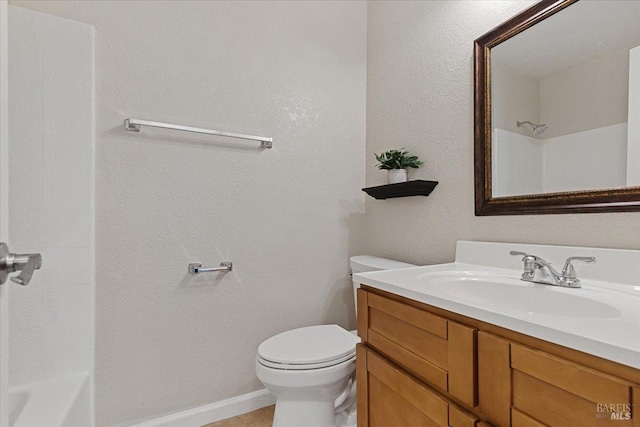 full bath featuring toilet, baseboards, and vanity