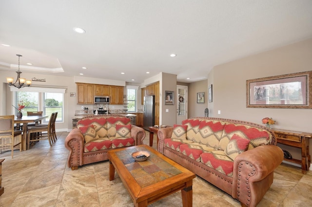 10240 Kost Rd, Galt, CA 95632 - living area featuring recessed lighting, a chandelier, and stone finish floor