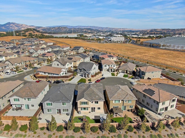 aerial view featuring a mountain view and a residential view