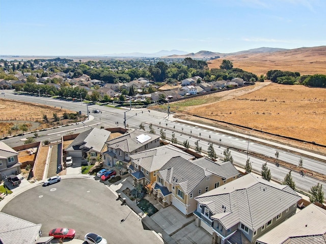 drone / aerial view with a mountain view and a residential view
