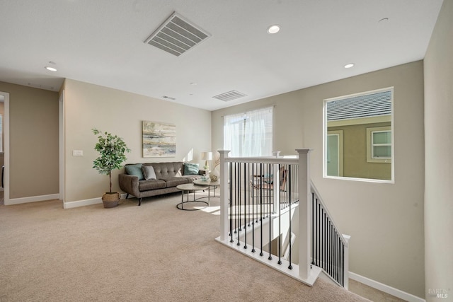 interior space with baseboards, visible vents, and recessed lighting