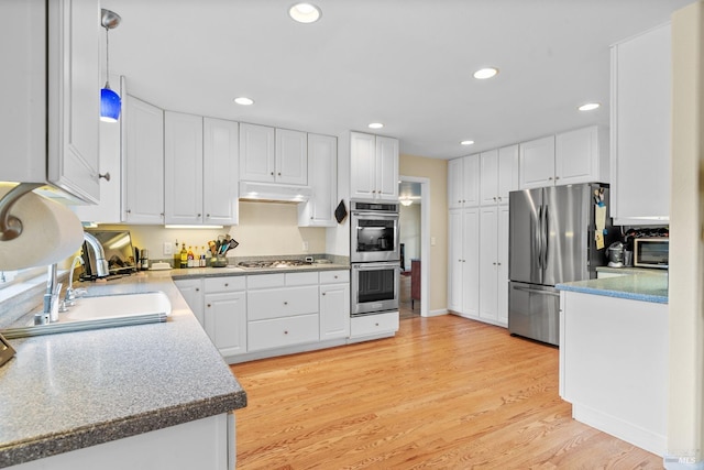195 Mountain Vista Pl, Santa Rosa, CA 95409 - kitchen featuring stainless steel appliances, a sink, under cabinet range hood, white cabinets, and recessed lighting