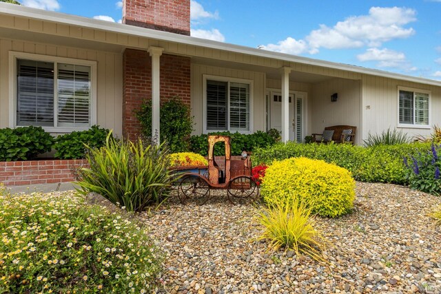 195 Mountain Vista Pl, Santa Rosa, CA 95409 - property entrance featuring a chimney and brick siding