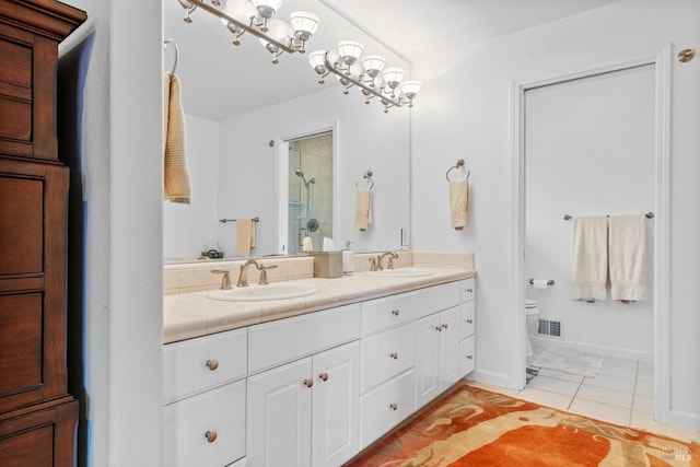 195 Mountain Vista Pl, Santa Rosa, CA 95409 - bathroom with double vanity, a shower stall, tile patterned flooring, and toilet