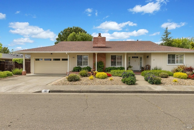195 Mountain Vista Pl, Santa Rosa, CA 95409 - ranch-style home featuring a chimney, an attached garage, concrete driveway, and a shingled roof