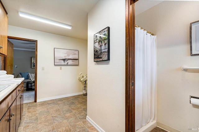 103 Camino Vis, Saint Helena, CA 94574 - bathroom featuring a shower with shower curtain, stone finish floor, baseboards, and vanity