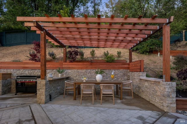 view of patio / terrace with a pergola, area for grilling, outdoor dining space, grilling area, and fence