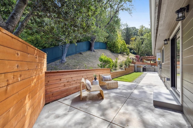 view of patio featuring a fenced backyard