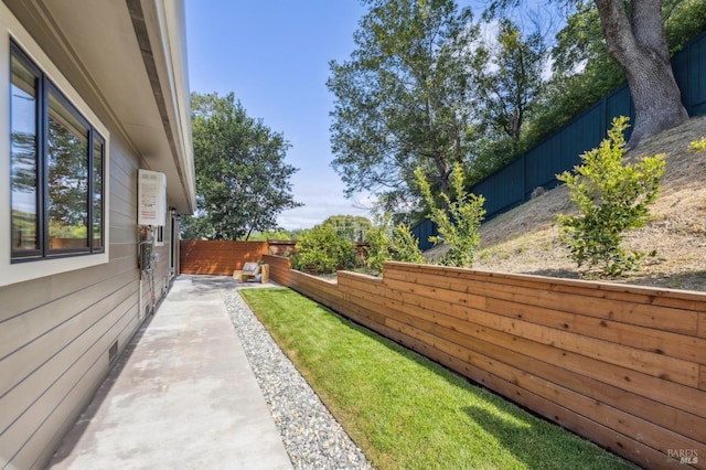 view of yard with a fenced backyard
