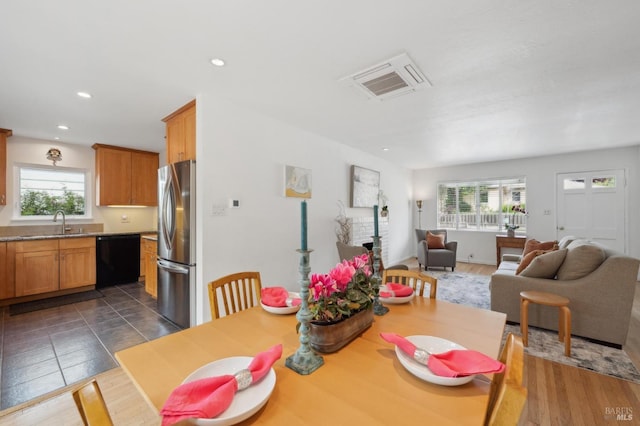 dining space featuring recessed lighting and a healthy amount of sunlight