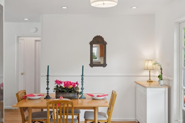 dining area with recessed lighting and light wood-style flooring