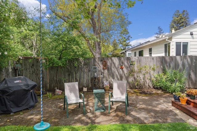 view of yard featuring a fenced backyard and a patio