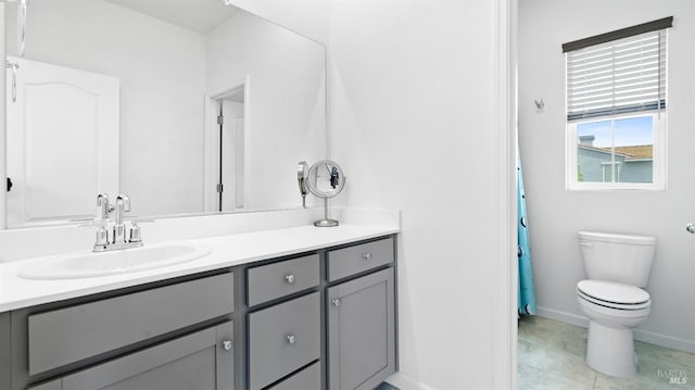 2350 White Dr, Fairfield, CA 94533 - full bathroom with baseboards, vanity, toilet, and tile patterned flooring