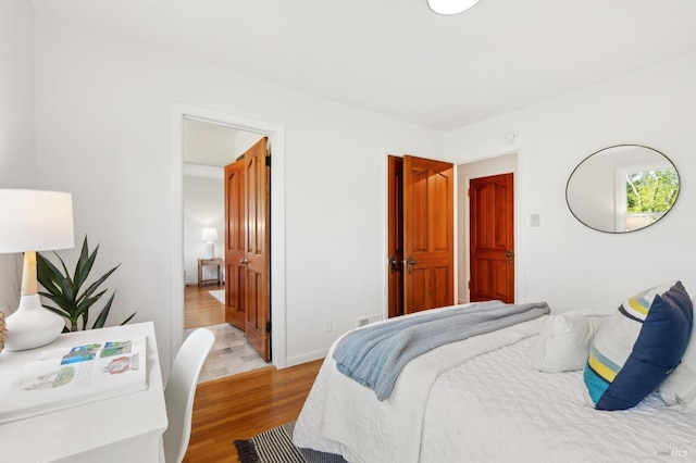 bedroom featuring light wood finished floors