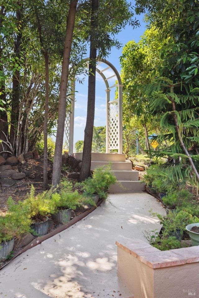 view of property's community featuring stairway